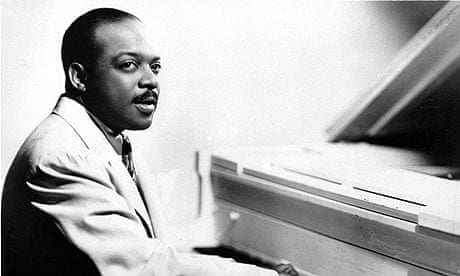 Picture of Count Basie at the piano. 